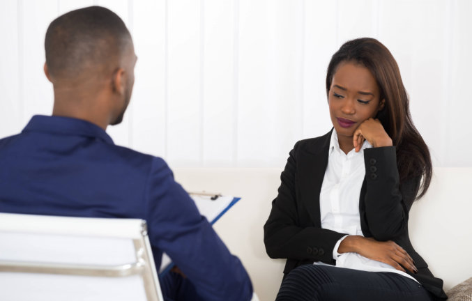 female african doing counseling to her young man counselor