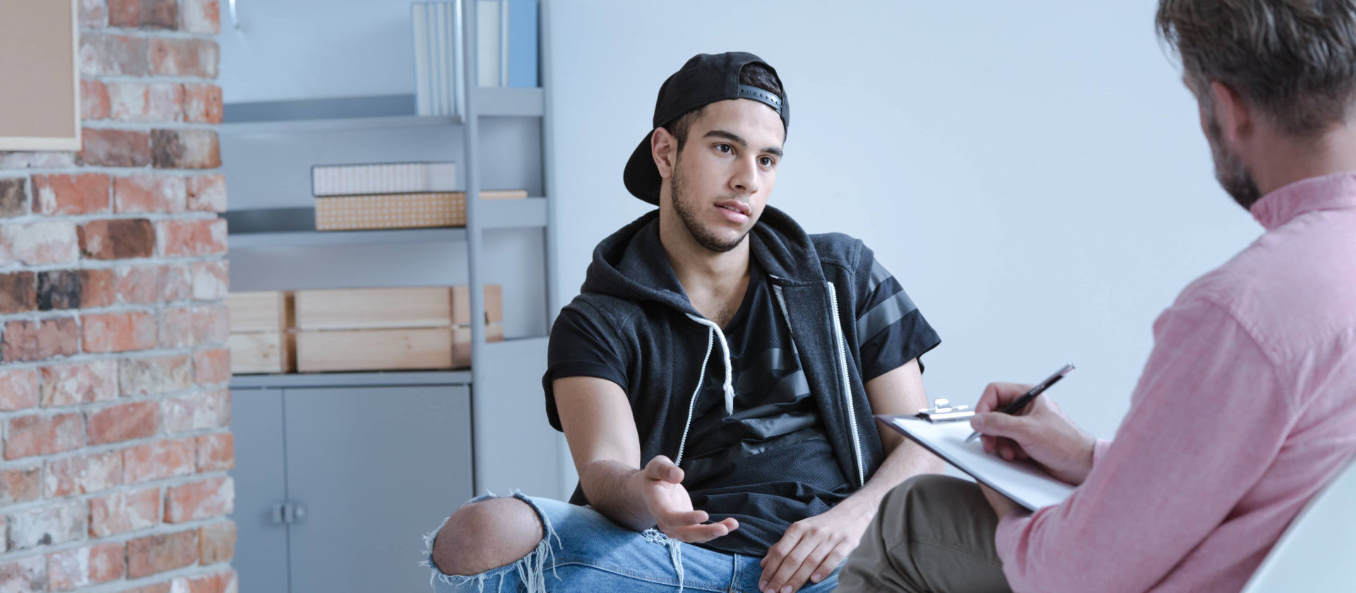 emotional young man doing counseling