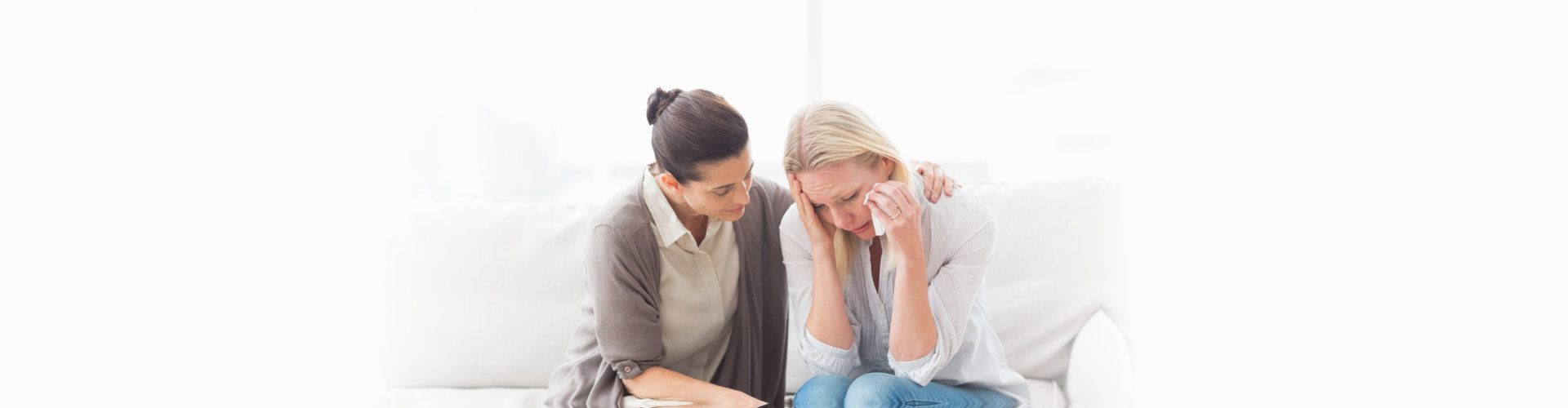 emotional woman with her counselor