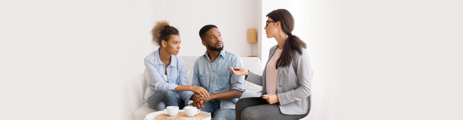 psychologist advising african american spouses