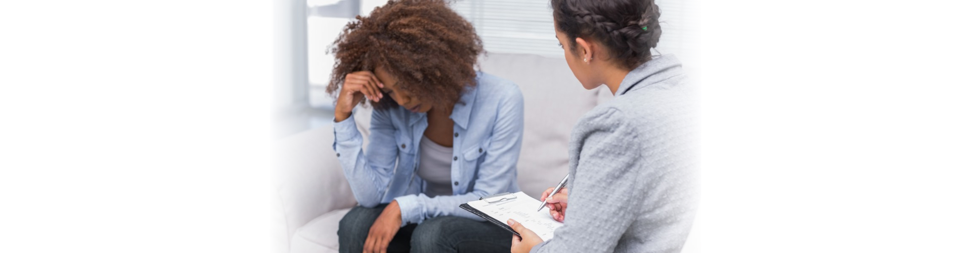 Woman sitting on therapists couch