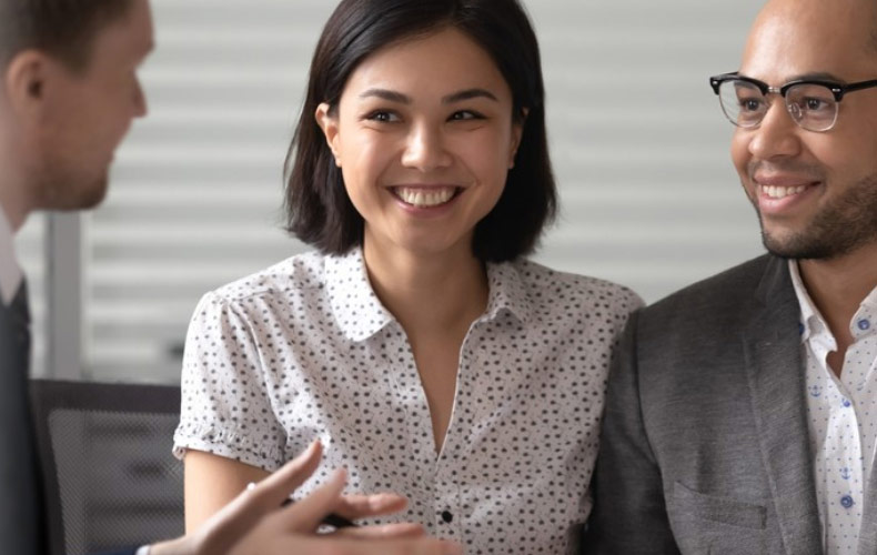 happy young hispanic couple visiting psychologist